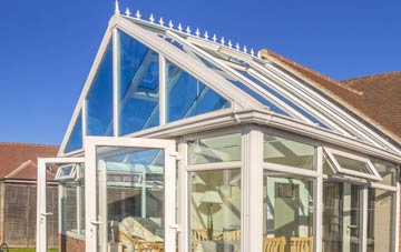 conservatory roof insulation costs Newton Peveril